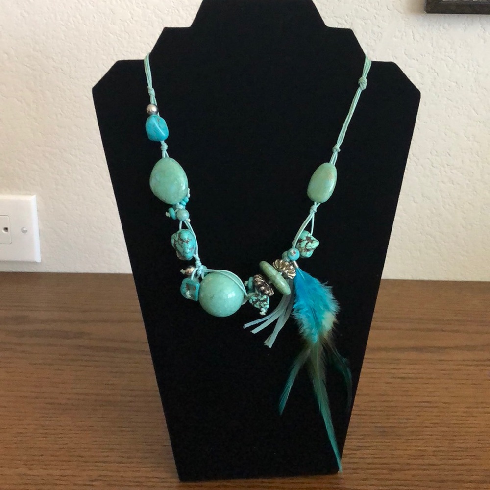 Turquoise like stones with feather